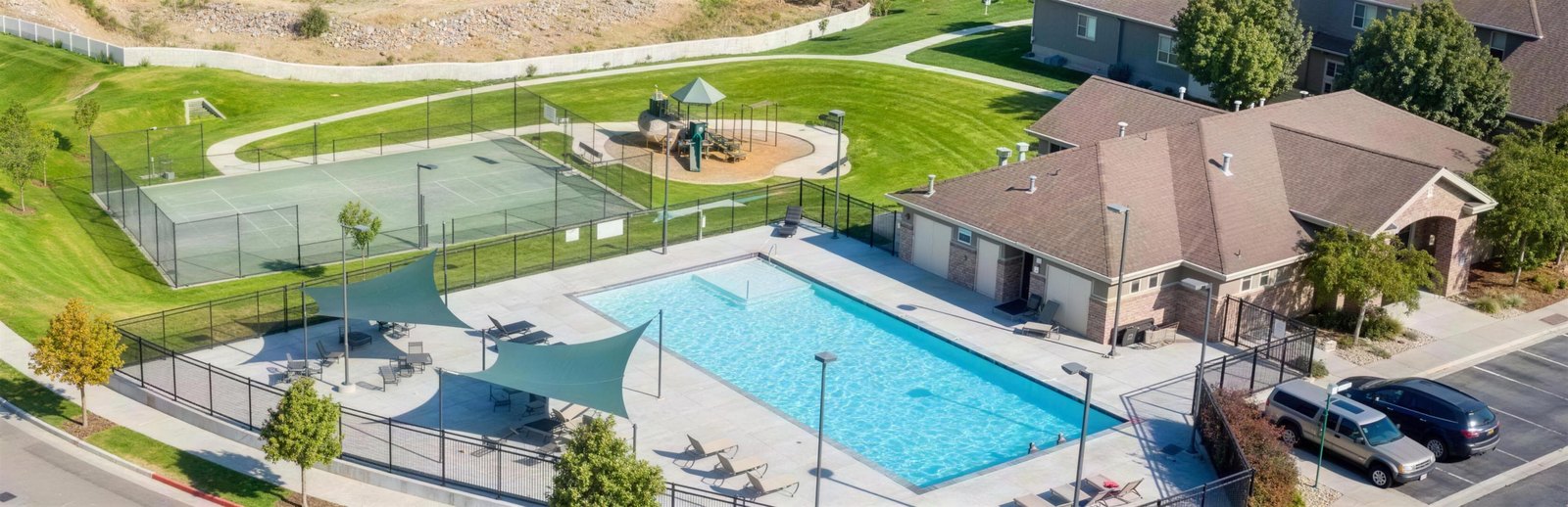 Aerial view of the Rose Creek Crossing clubhouse, pool and playground